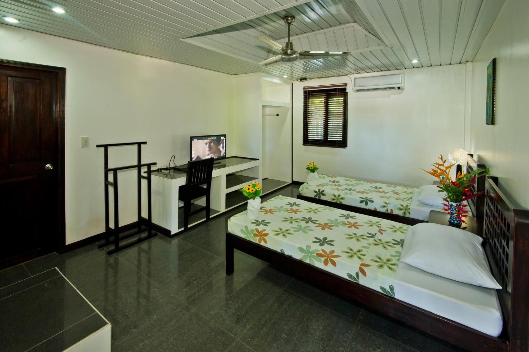 Balay Tuko Garden Inn Puerto Princesa Room photo